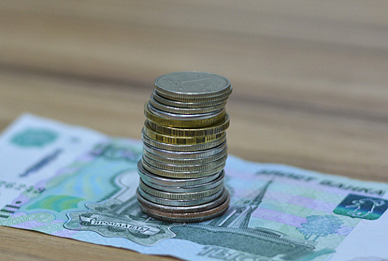 Курс доллара 20 мая опустился ниже 58 рублей